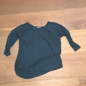 girls green shirt with lace back detailing